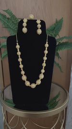 Load and play video in Gallery viewer, Long Golden Sphere Necklace
